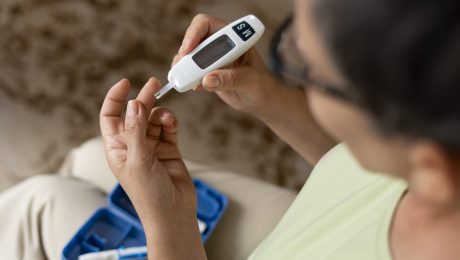high-angle-diabetic-woman-checking-her-glucose-level (1)